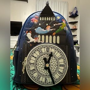 Lounge fly Peter Pan, backpack, and wallet.